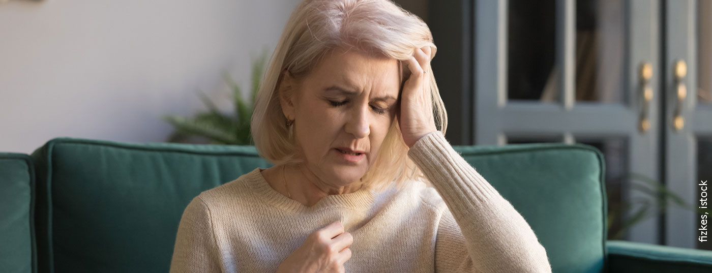 krank_schwindel_frau_istock-1158702151
