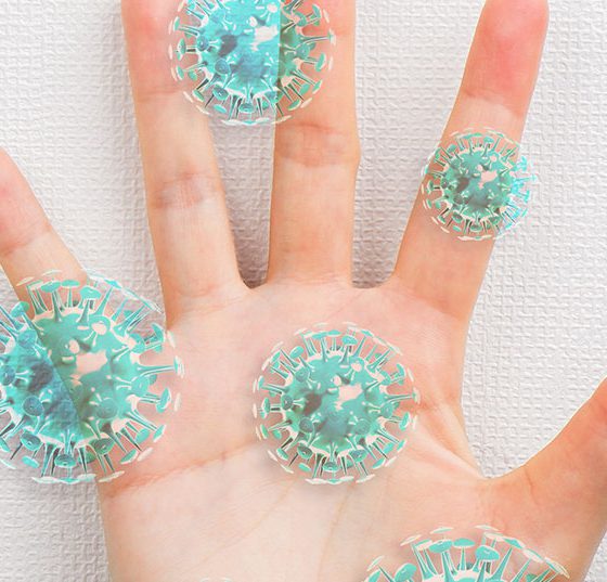 corona_hand_istock-1221120512